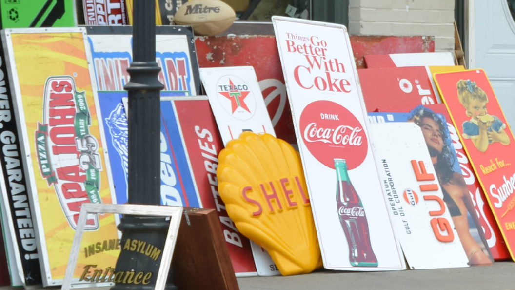 Vintage signs outside Attic Treasures Antiques in Watkinsville