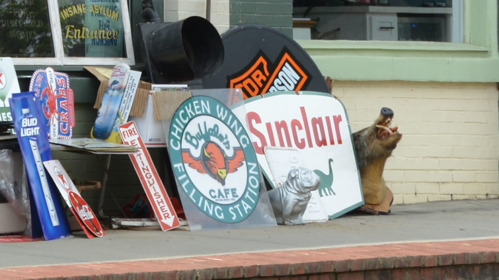 Vintage signs outside Attic Treasures Antiques in Watkinsville