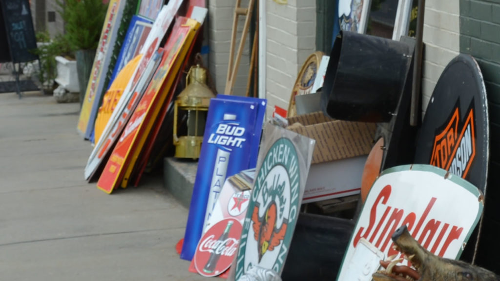 Vintage signs outside Attic Treasures Antiques in Watkinsville